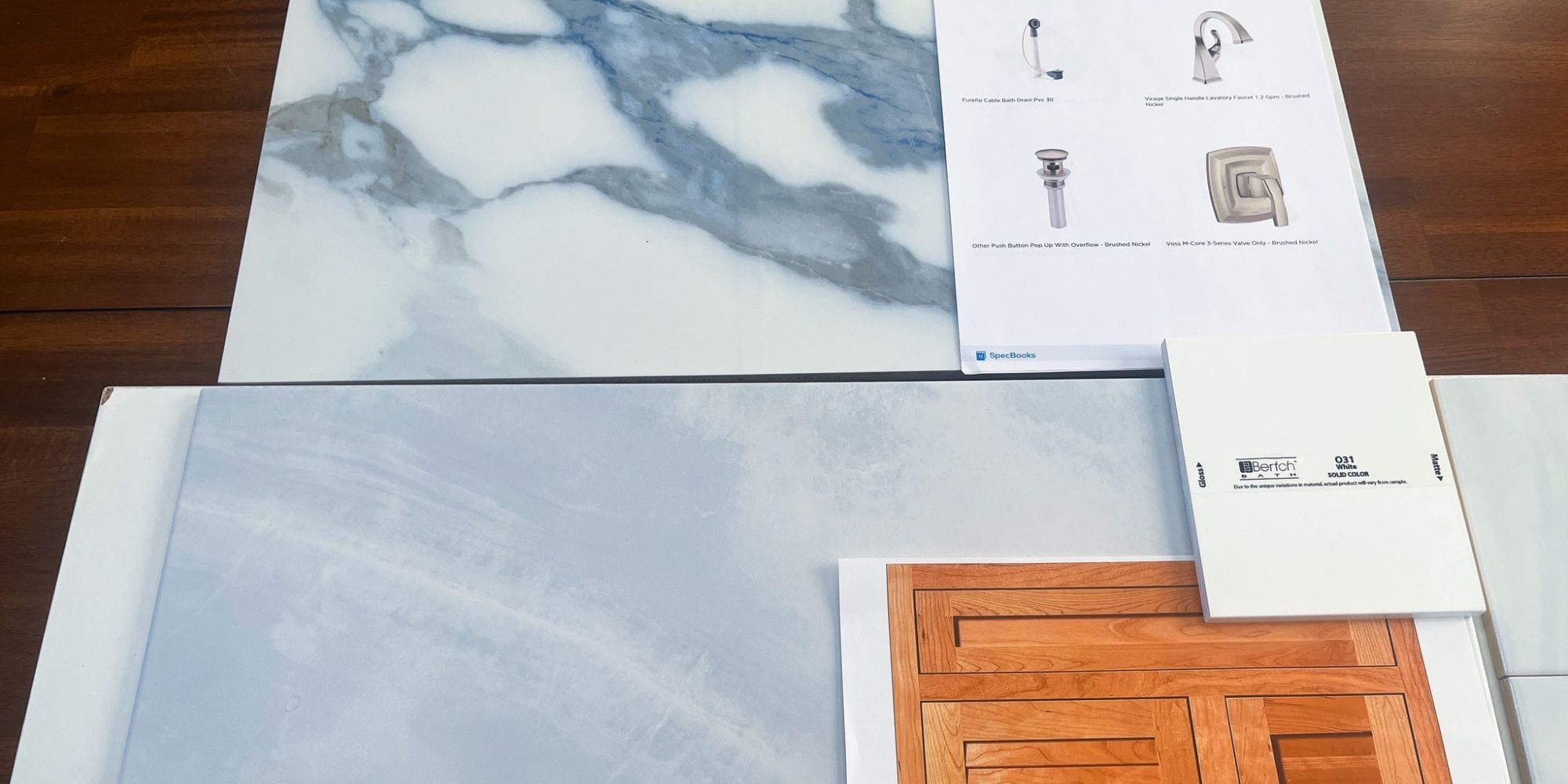 Design material selections for a bathroom remodel in Hampton, NH with satin nickel faucets and porcelain tile flooring