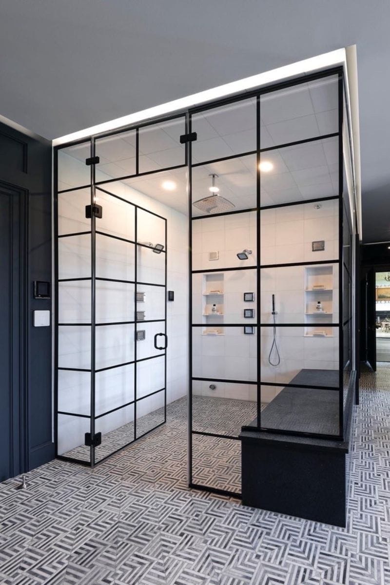 Master bath remodel in North Hampton, NH with a high-end steam shower, body jets, rainfall shower, and custom glass enclosure