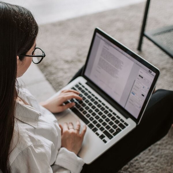 Woman on a laptop doing research