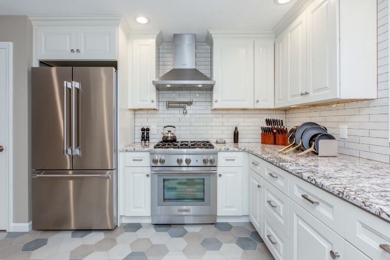 Transitional kitchen remodel with granite countertops and high-end appliances in Rye, NH