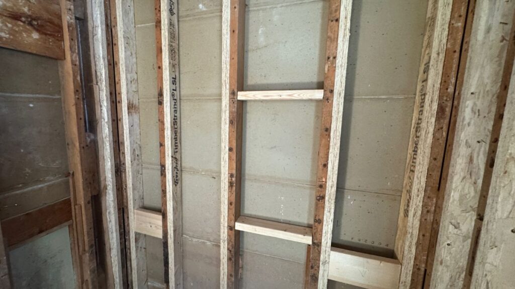 LSL engineered studs in the shower walls of a Dover, NH bathroom remodel